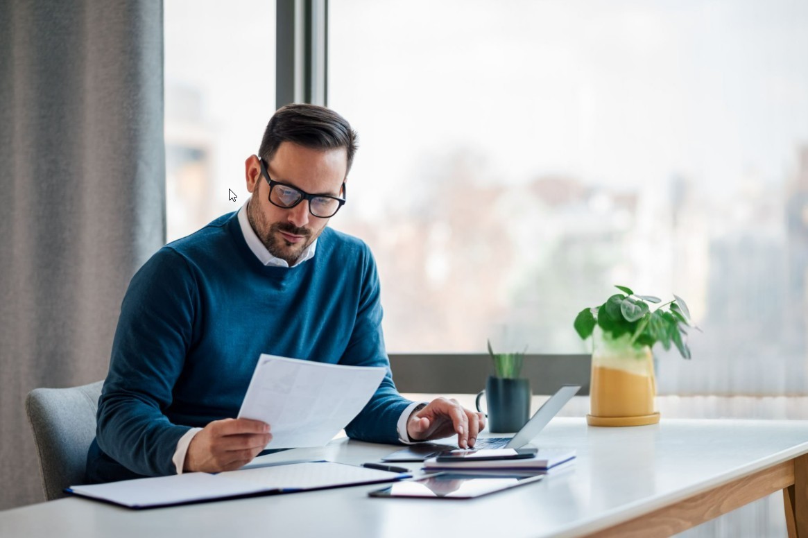 Hero Image, reviewing insurance